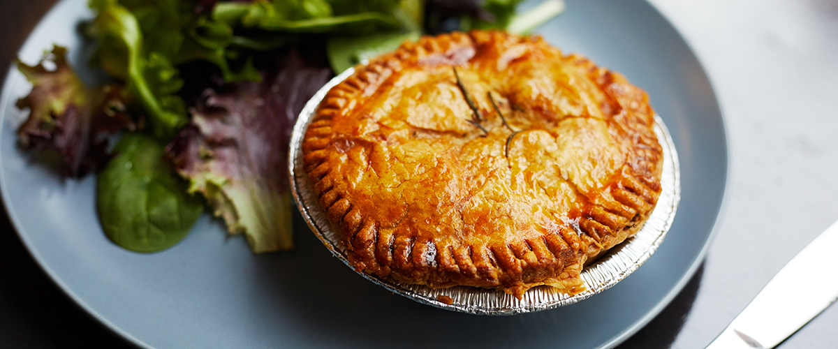 Pie on blue plate at Banksia Bistro