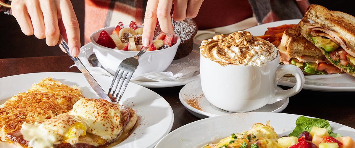 Table full of breakfast items at eggtc.