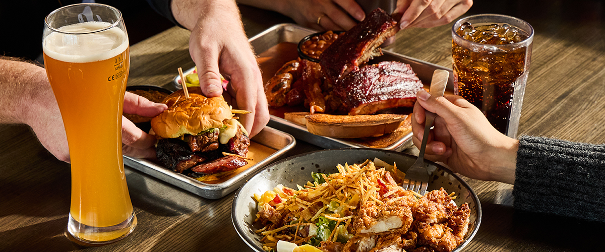 Table full of barbecue at Meat Mitch