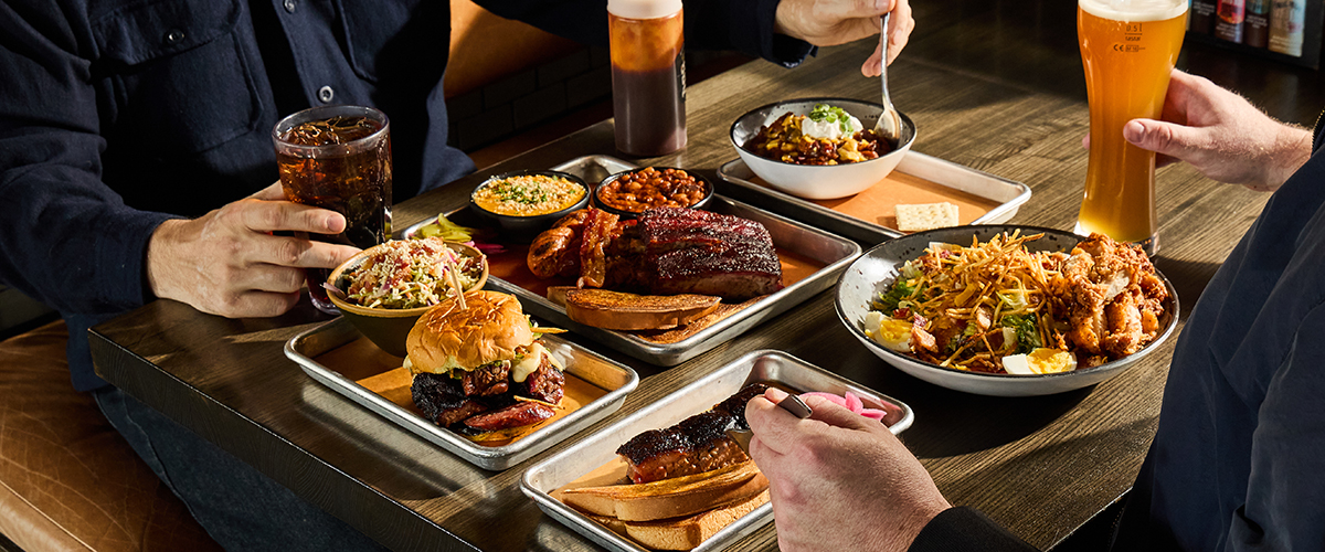 Table full of barbecue at Meat Mitch